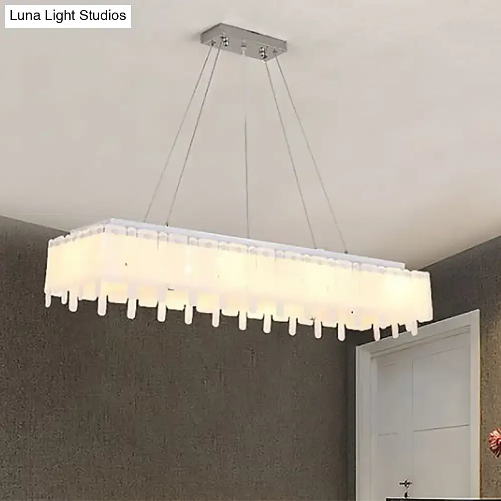 DecorBites™ adjustable acrylic led island pendant light with sleek chrome mount and hanging cord features warm diffuser panels