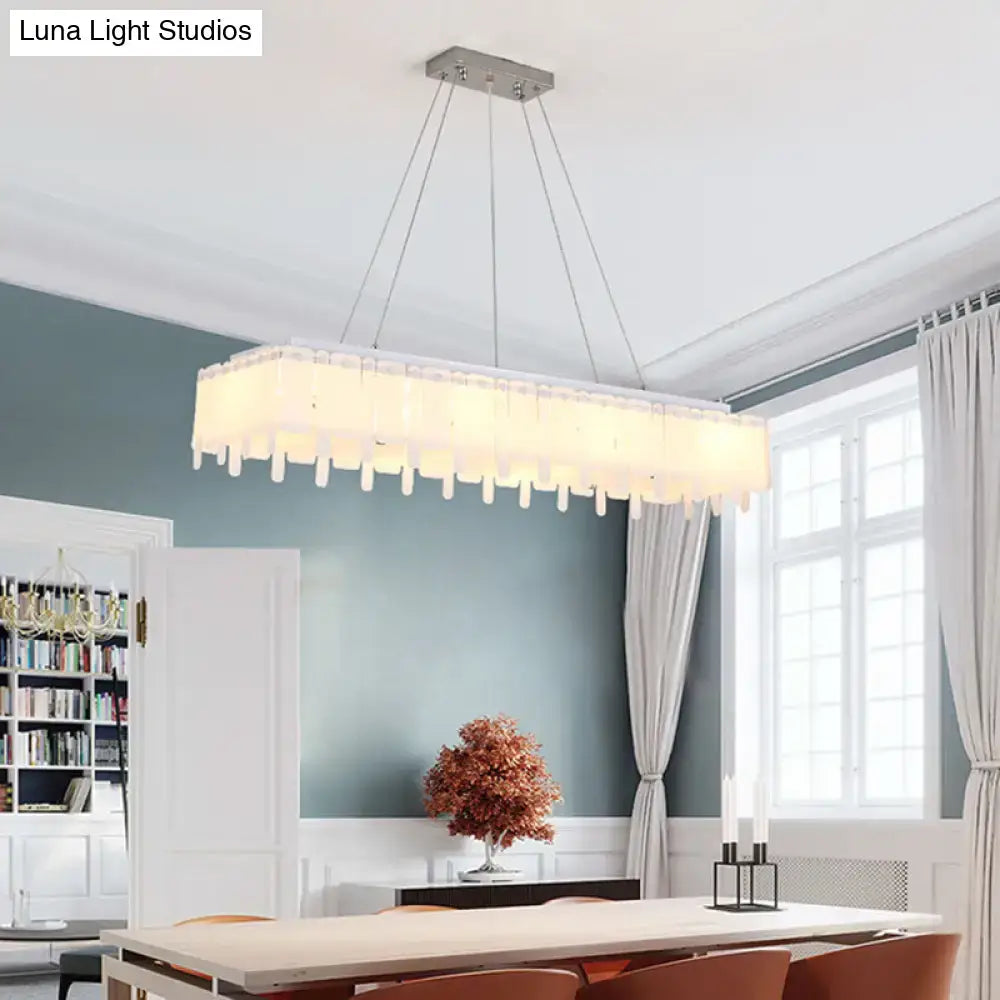 Modern rectangular DecorBites™ adjustable acrylic LED island pendant light with sleek metallic frame and hanging cord