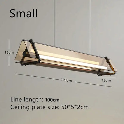Modern rectangular amber led pendant lamp with transparent glass panels and black metal frame for dining room decorbites amber led