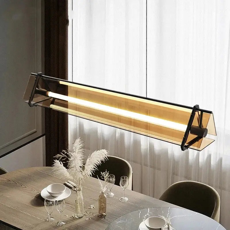 Modern rectangular amber led pendant lamp with amber tinted glass and black metal frame for dining room decorbites amber led