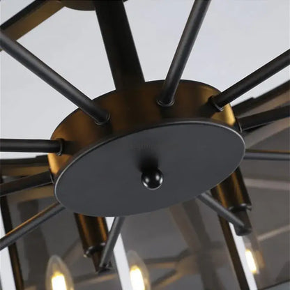 Modern rectangular black crystal chandeliers with industrial-style black and brass-toned metal arms for dining room decorbites crystal chandeliers