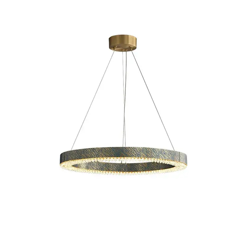 Modern rectangular blue copper crystal led chandelier with circular textured dark metallic ring and brass ceiling mount decorbites blue copper