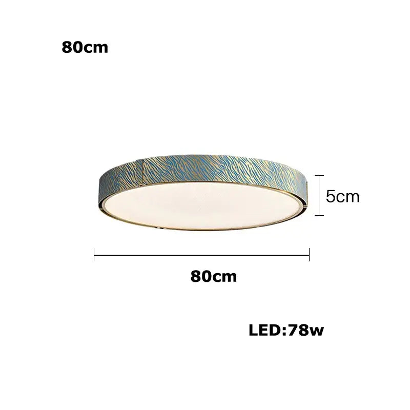 Modern rectangular blue copper crystal led chandelier with circular textured zebra-striped blue and silver ceiling light rim