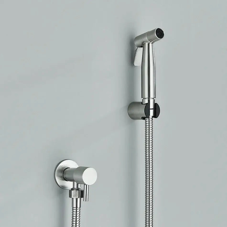 Modern chrome-finished handheld showerhead with braided hose and black grip accents for decorbites brass bidet faucet use