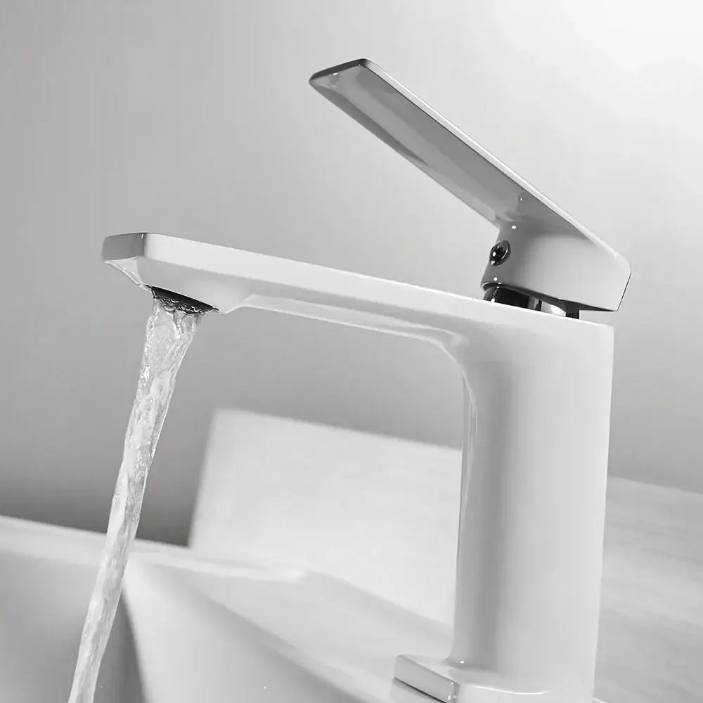 Modern rectangular brushed nickel bathroom sink faucet with a white ceramic body and chrome accents for decorbites brushed nickel bathroom decor