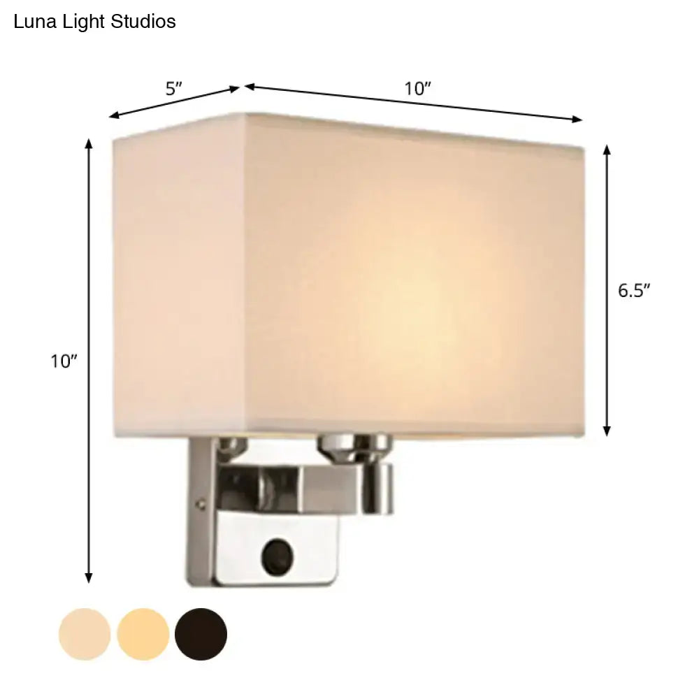 Modern rectangular chrome wall sconce with white beige fabric shade and metal base for bedroom lighting