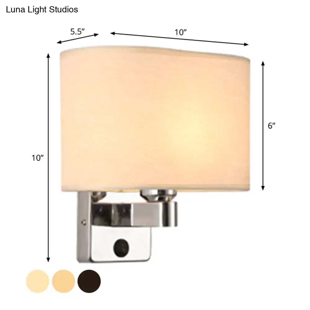 Modern rectangular chrome wall sconce with white beige fabric shade for bedroom lighting featuring a black white beige look