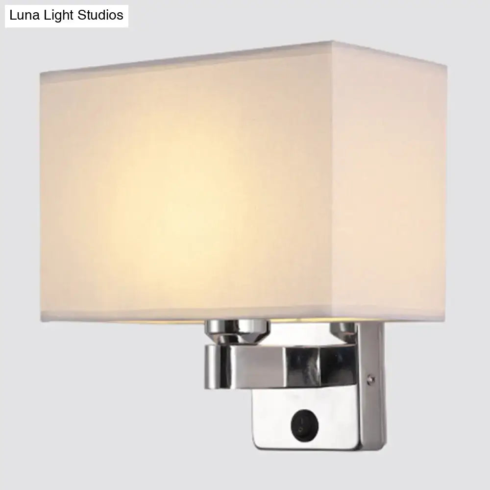 Modern rectangular chrome wall sconce with white beige fabric shade and polished metal base for bedroom light