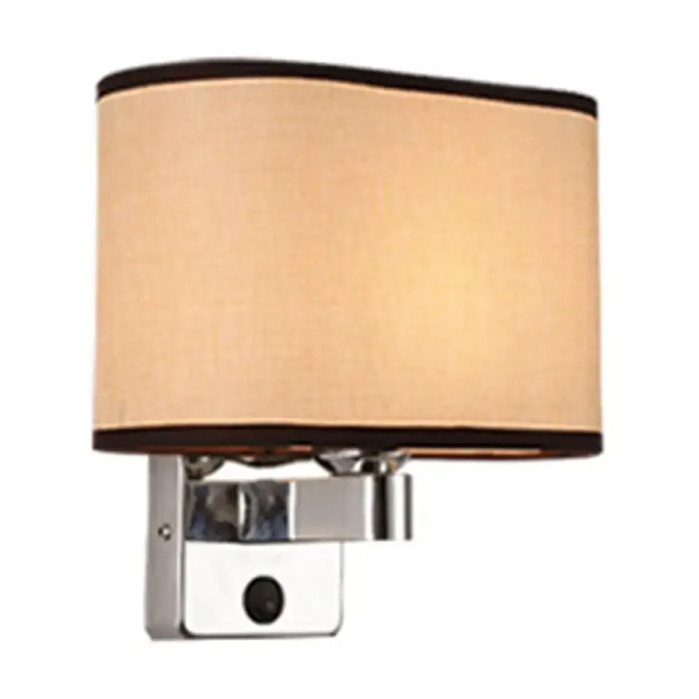 Modern rectangular chrome wall sconce with white beige fabric shade and black trim on a sleek metal bracket for bedroom lighting