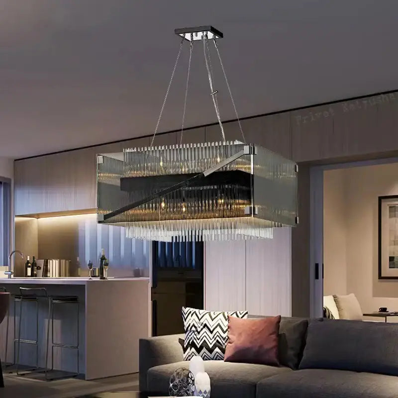 Modern rectangular crystal glass pendant chandelier with sleek metallic frame and cascading crystal strands for dining room decorbites crystal glass