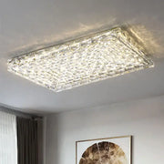 Modern rectangular decorbites crystal led ceiling light with faceted surface refracting warm white light for living room