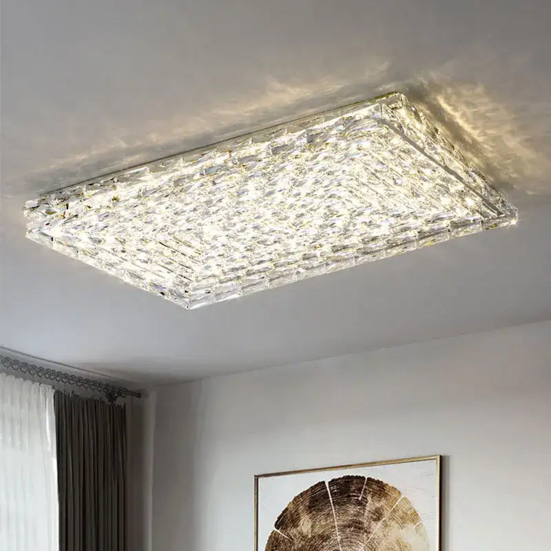 Modern rectangular decorbites crystal led ceiling light with faceted surface refracting warm white light for living room