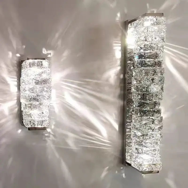 Modern rectangular crystal wall sconce with clear faceted blocks and sleek metallic frame for bedroom decorbites crystal wall lighting