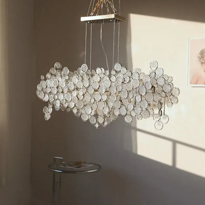 Modern rectangular glass led chandelier with silver metal frame and textured clear glass discs for living room pendant light