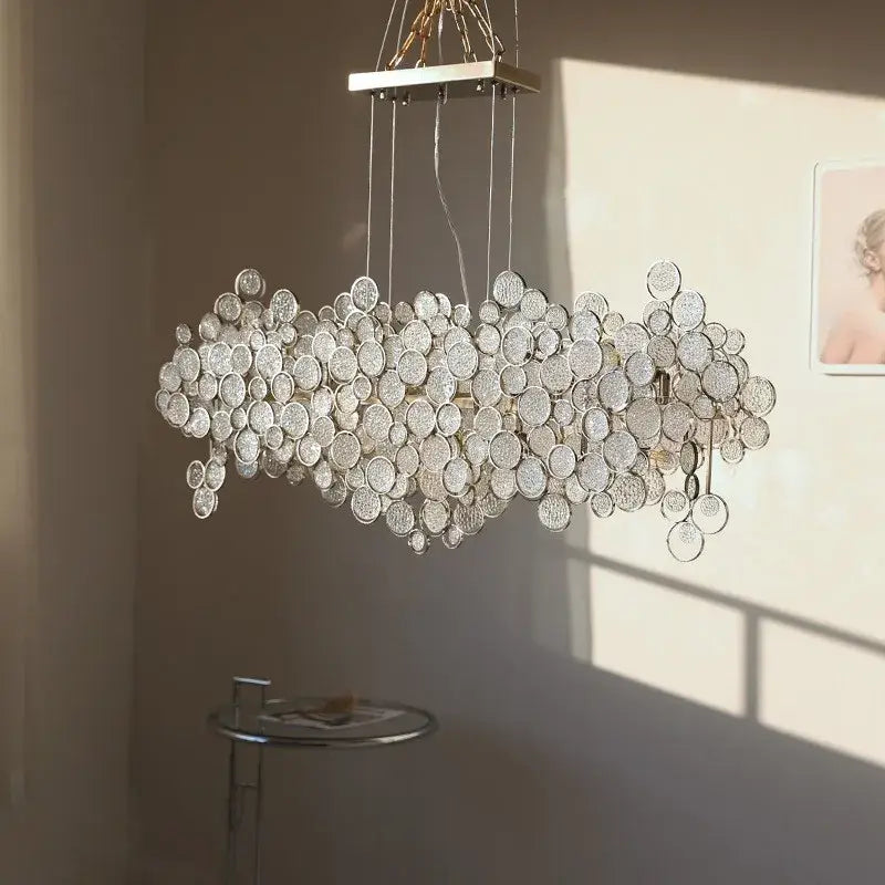 Modern rectangular glass led chandelier with silver metal frame and textured clear glass discs for living room pendant light