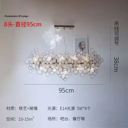 Modern rectangular glass led chandelier with eight frosted glass orbs suspended from a dark metal frame for living room