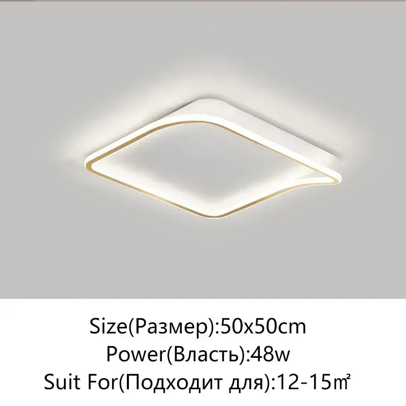 Modern rectangular golden led ceiling chandelier with a sleek white and gold frame emitting soft ambient light decorbites golden led