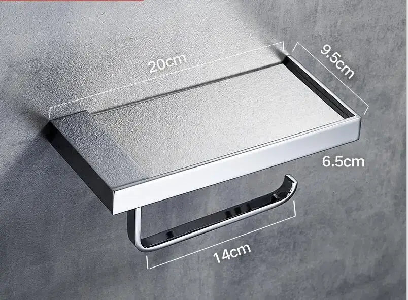 Modern chrome-finished rectangular metal toilet paper holder with tray and integrated roll support for bathroom use