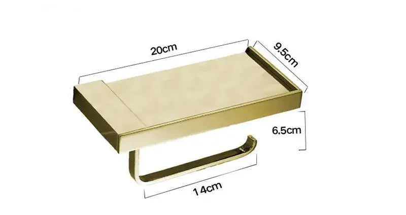 Modern gold-toned metal toilet paper holder with rectangular tray and curved support arm for bathroom use