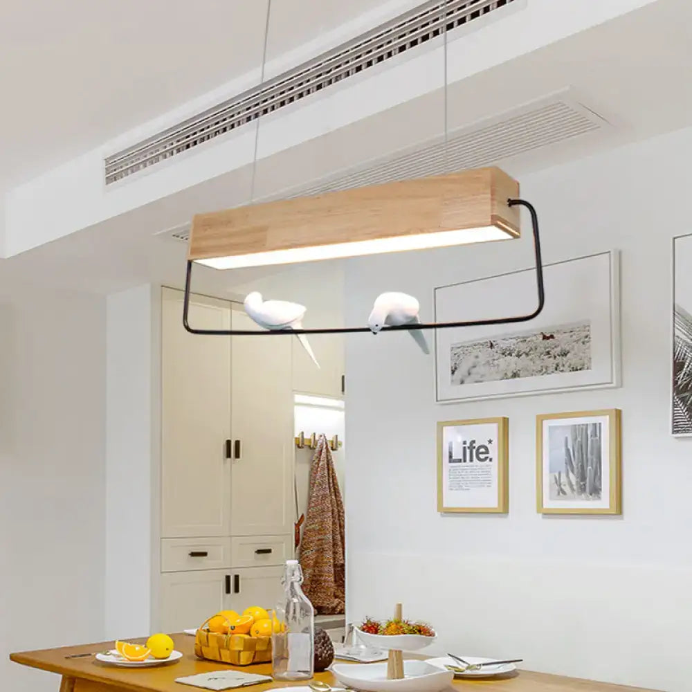 DecorBites modern rectangular wood pendant light with black metal frame and ceramic bird figurines for dining room