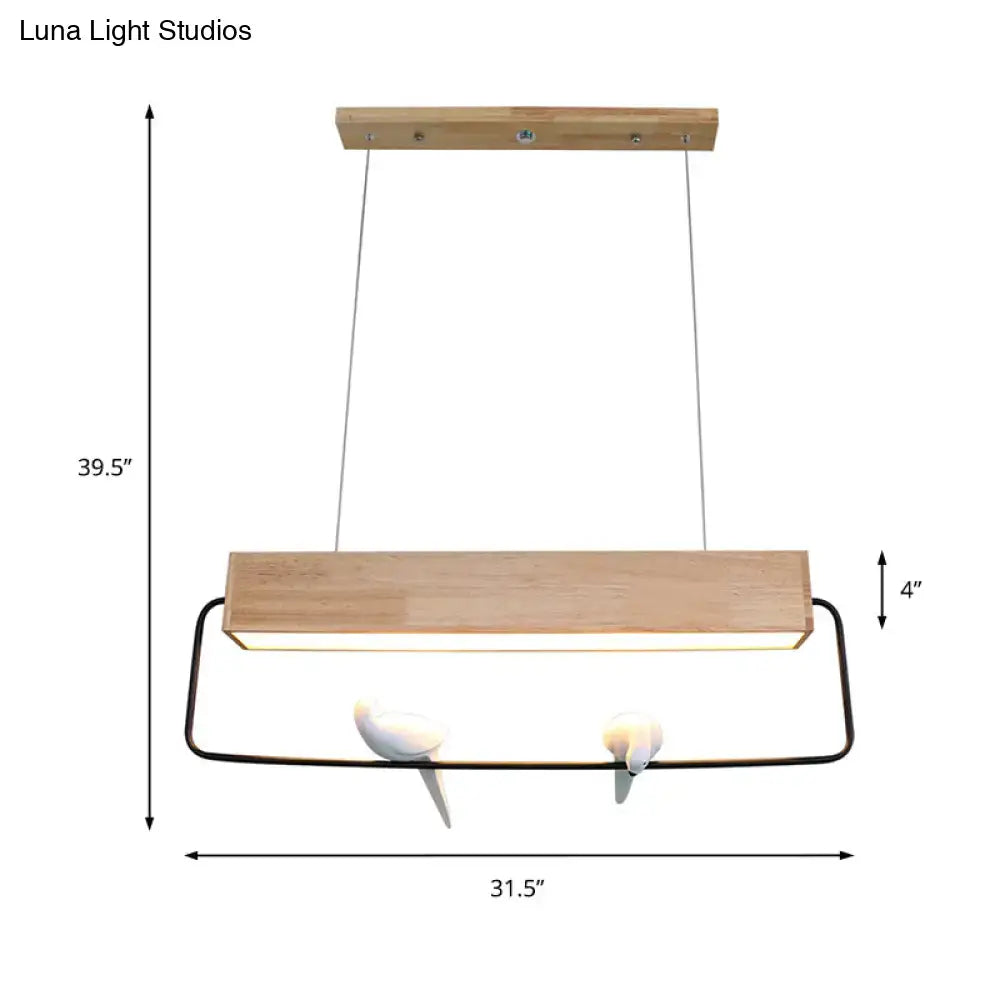 DecorBites modern rectangular pendant light with natural wood finish black frame and ceramic bird accents for dining room