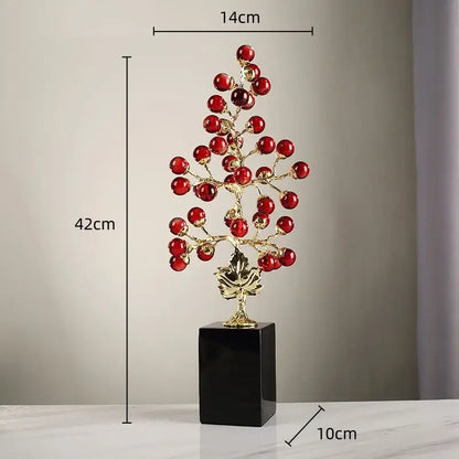 Modern red and gold grape vine metal sculpture with decorative berries and glossy black base for living room decorbites grape vine