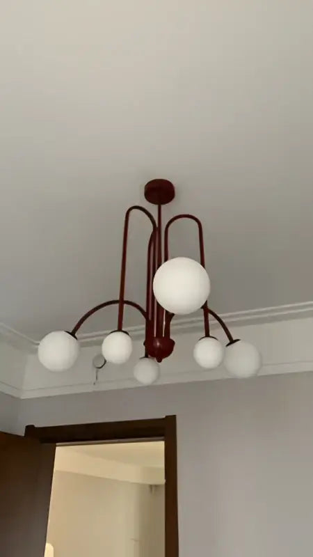 Modern red and white branch glass pendant lights featuring dark red metal frame and white glass shades for living room decorbites branch glass pendant