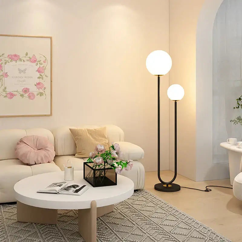 Modern black white metal floor lamp with dual spherical glass shades for living room decorbites black white style