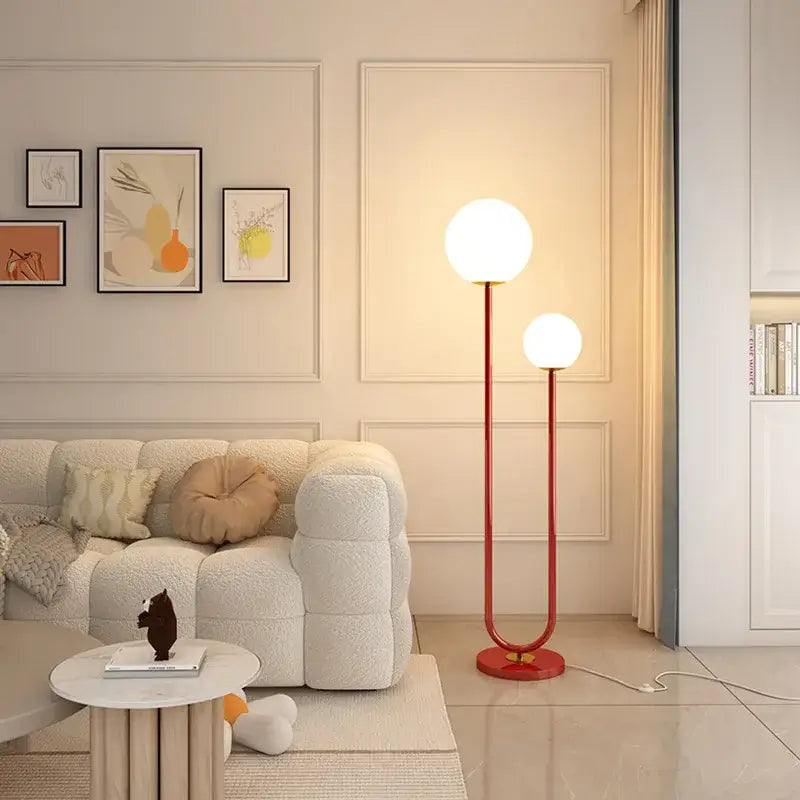 Modern red and white metal floor lamp with dual spherical glass shades for living room decorbites black white metal style
