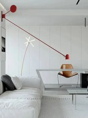 Modern red wall sconce with black swing arm and adjustable led design perfect for bedroom decorbites lighting