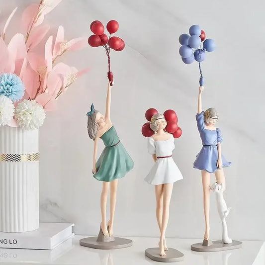 Modern red and blue balloon girls resin figurines featuring three women in dresses with balloons and a white cat for living room decor