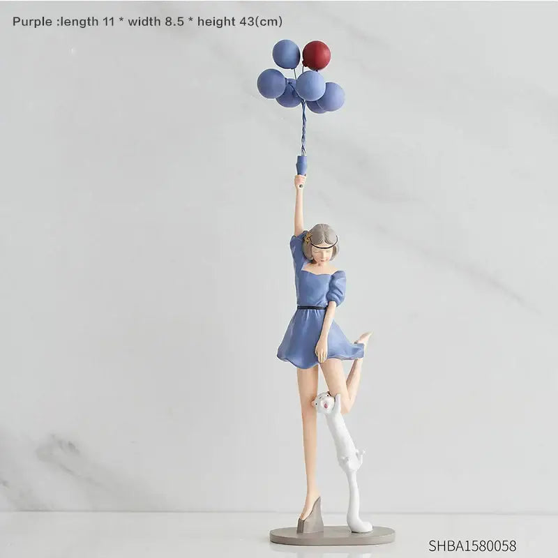 Modern red and blue balloon girls resin figurine featuring a purple resin woman in a blue dress with a white cat at her feet