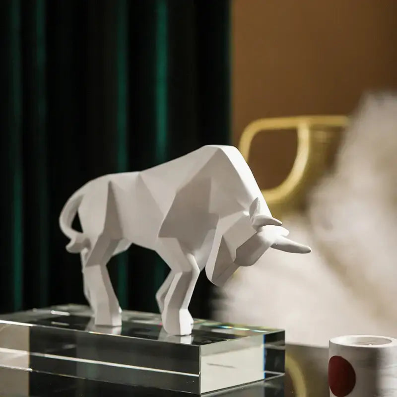White angular decorbites geometric bison sculpture on clear acrylic base for modern living room decor