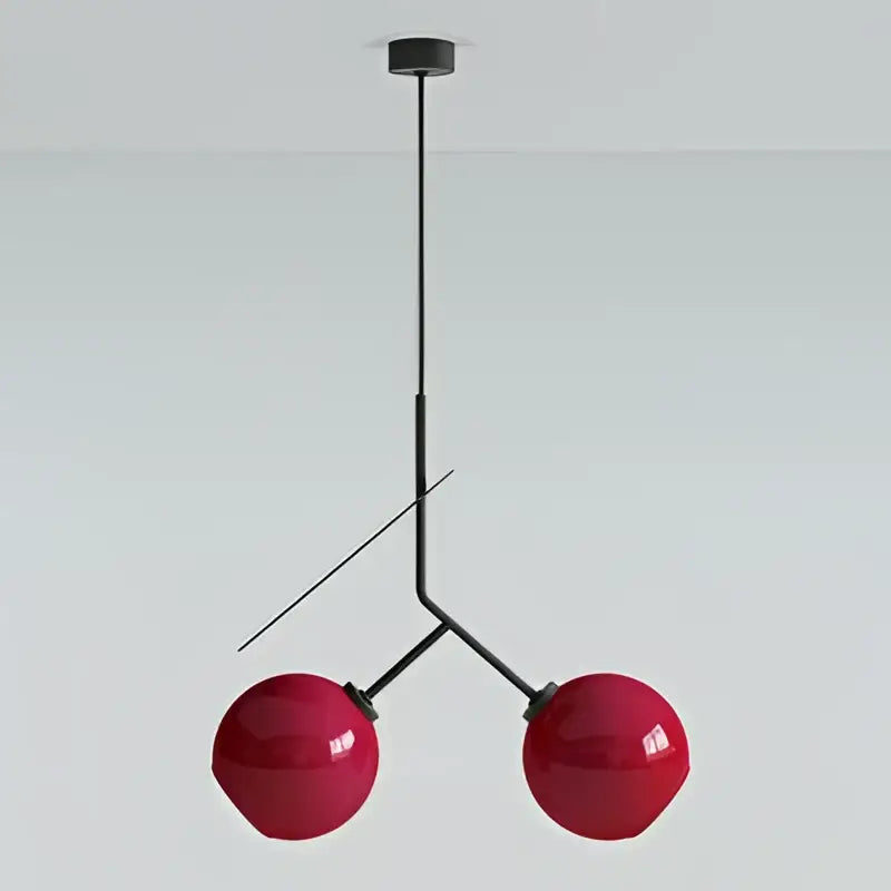 Modern red glass cherry led pendant light with spherical shades and black metal arms for dining room decorbites cherry led