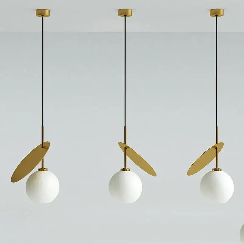 Three modern pendant lights with white glass shades and gold accents for decorbites cherry led dining room fixture