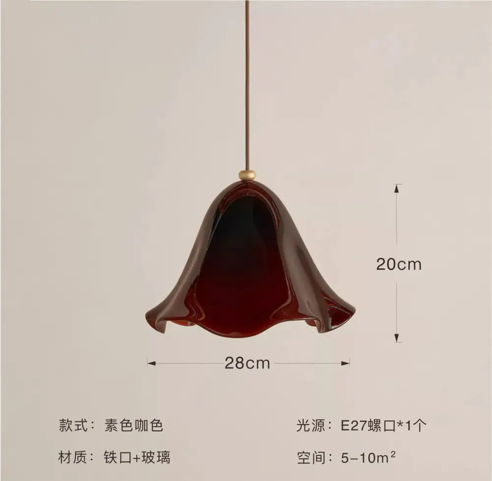 Modern red glass pendant light with black dots featuring a glossy deep burgundy glass pendant and iron suspension for dining room