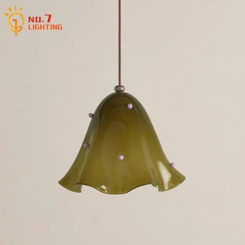 Modern olive-green glass pendant light with lavender accent beads and bell shape for dining room use