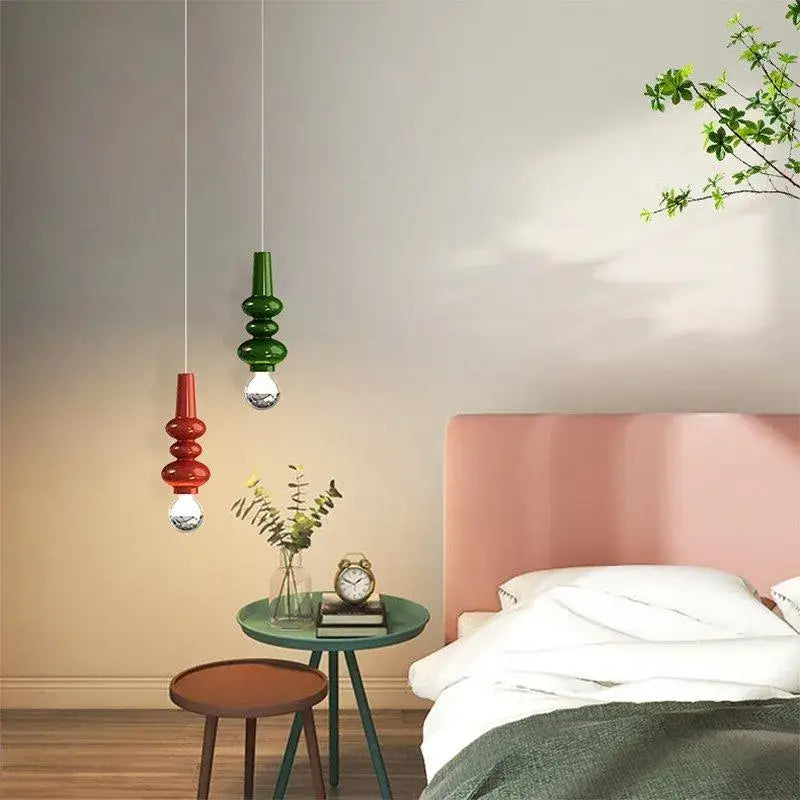 Modern red and green caterpillar iron led pendant light featuring stacked bulbs for stylish bedroom decorbites pendant light