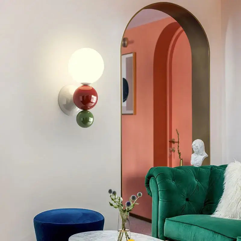 Modern red and green led wall light with spherical white glass globe and acrylic spheres for kids room decorbites led wall