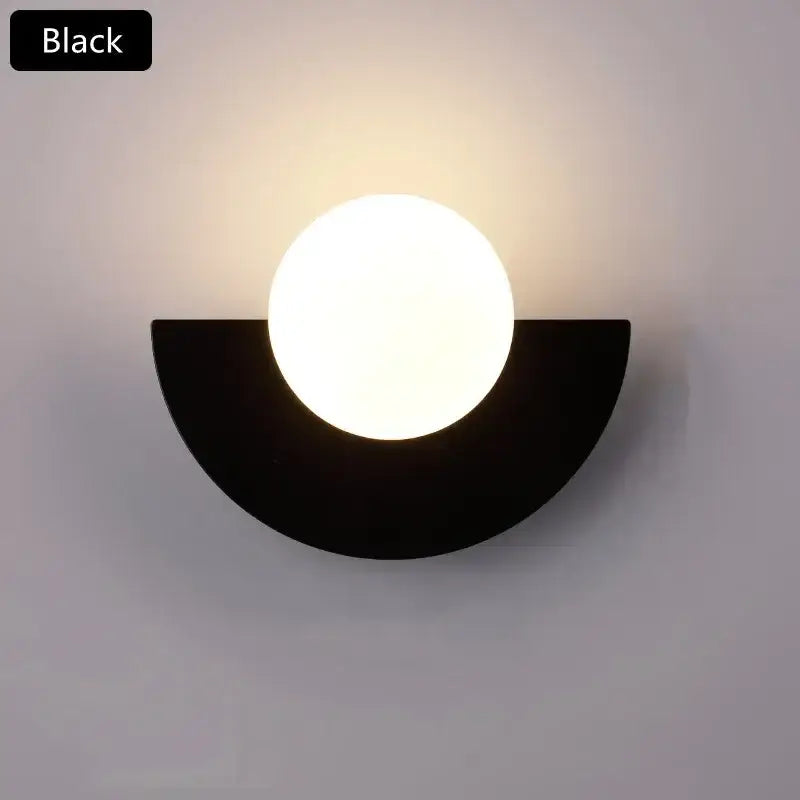 Black semi-circular wall lamp with a glowing white glass ball led for modern red and orange bedroom ambient decorbites glass ball