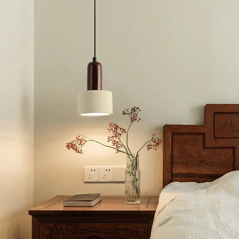 Modern reddish brown and cream decorbites cement cylinder led pendant with a dark brown top and diffused white shade