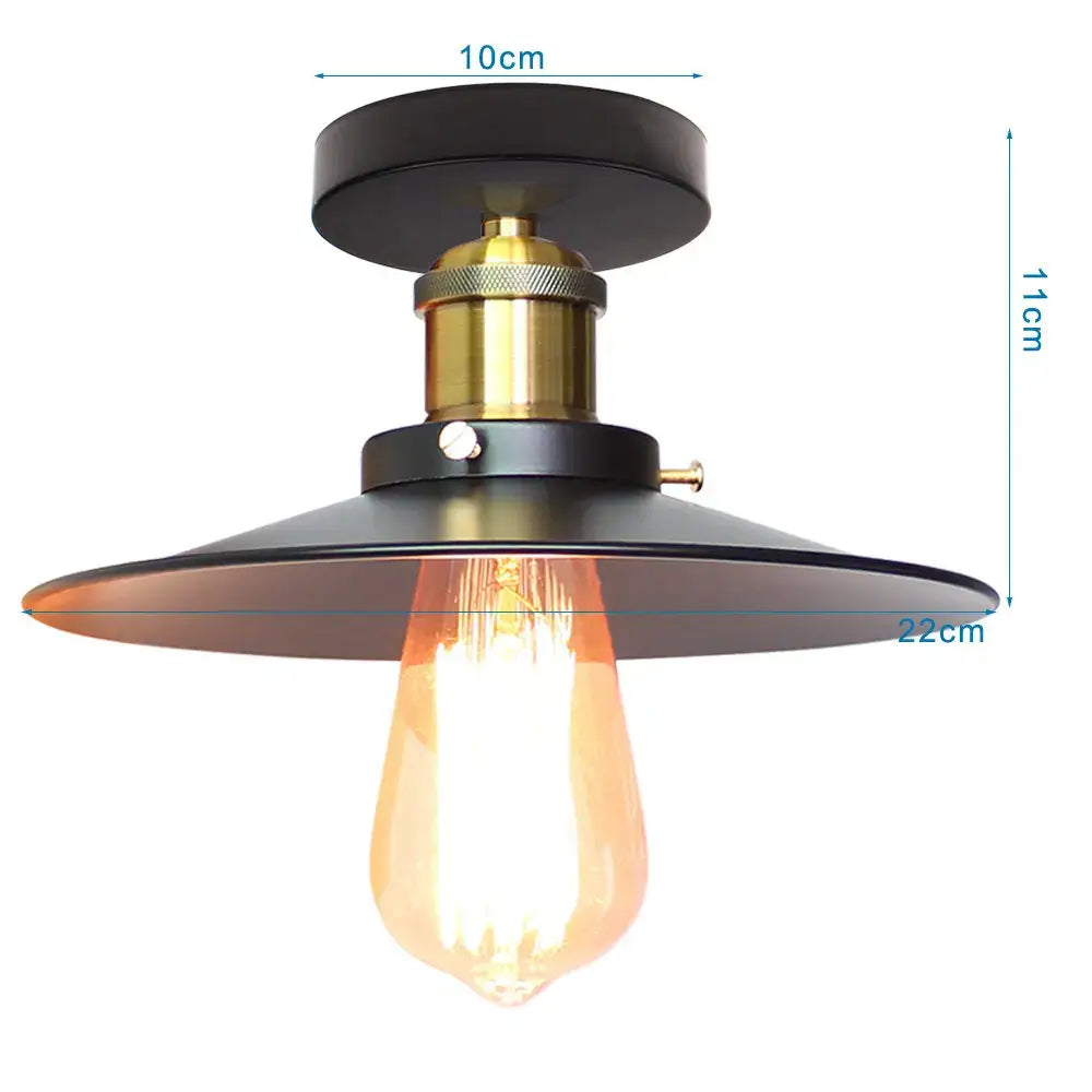 Modern retro black iron cage ceiling light with black matte shade brass accents and exposed Edison bulb for kitchen lighting decorbites iron cage