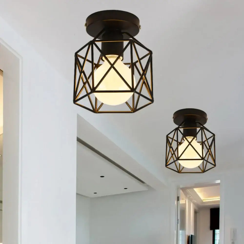Modern retro black iron cage ceiling light with warm glowing bulb for kitchen lighting decorbites iron cage ceiling