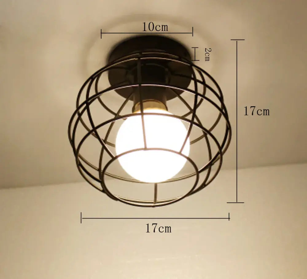 Modern retro black iron cage ceiling light with warm white bulb for kitchen lighting by decorbites iron cage ceiling