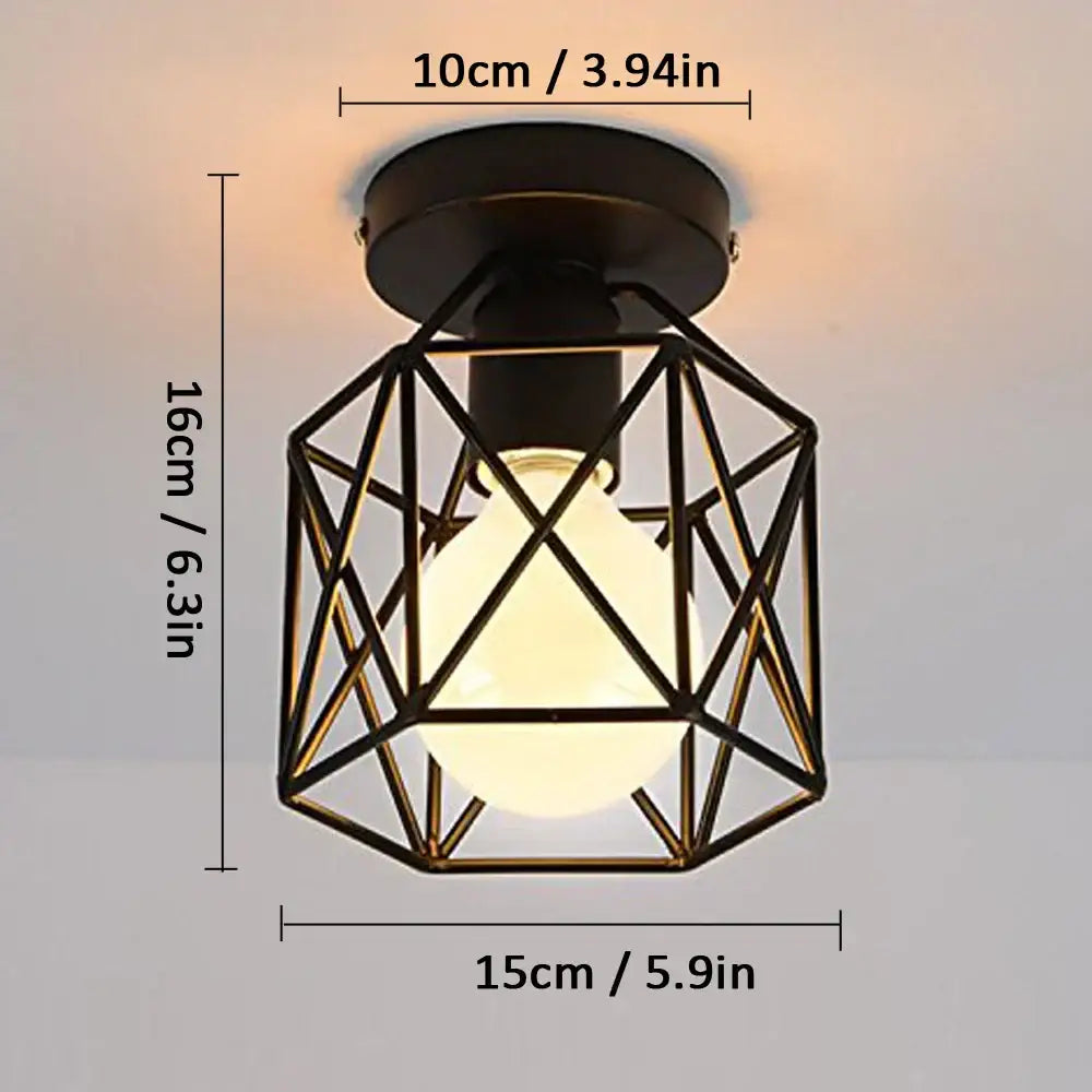 Modern retro black iron cage ceiling light with warm glowing bulb perfect for kitchen lighting decorbites iron cage ceiling