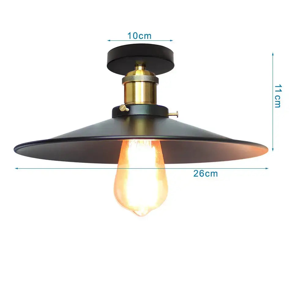 Black metal industrial-style ceiling light with brass fixture and exposed edison bulb for kitchen decorbites iron cage ceiling