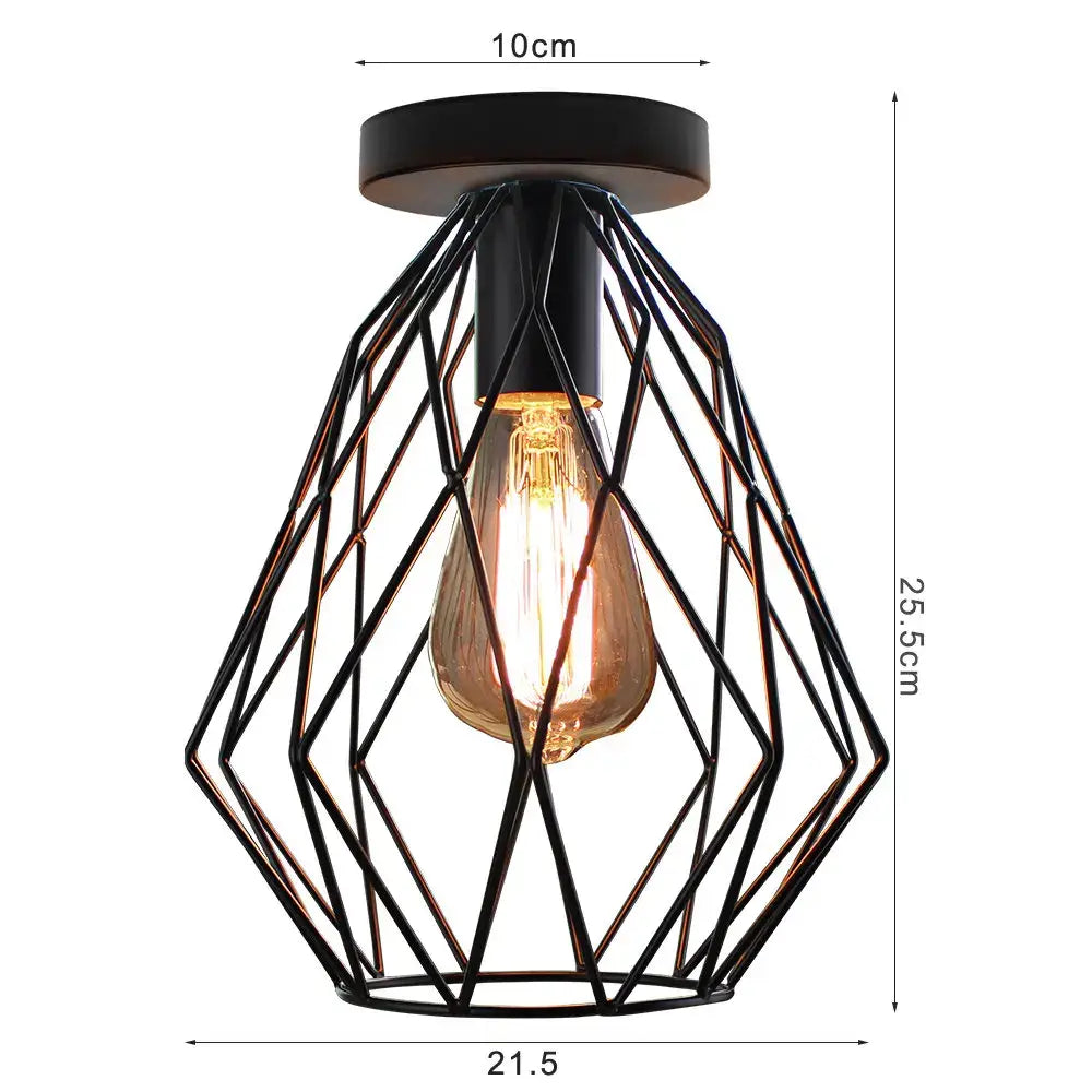 Modern retro black iron cage ceiling light featuring a black metal geometric cage and exposed edison bulb for kitchen lighting