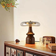 Modern retro gold lustre wood table lamp with warm brown ceramic base and translucent glass shade for decorbites gold lustre decor