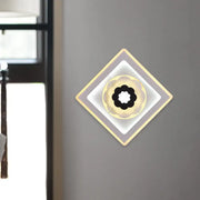 Modern rhombus bloom pattern sconce light with layered concentric rings in gray cream gold tones and black and white bulb base