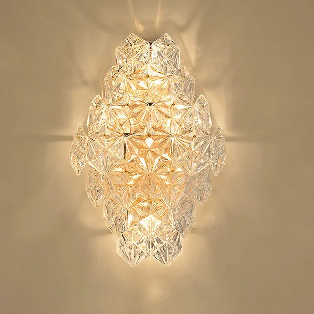 Modern rhombus clear crystal wall sconce with faceted geometric glass pieces direct wired electric light type